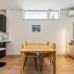 Central 3-Story With Private Balcony