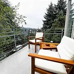 Central 3-Story With Private Balcony